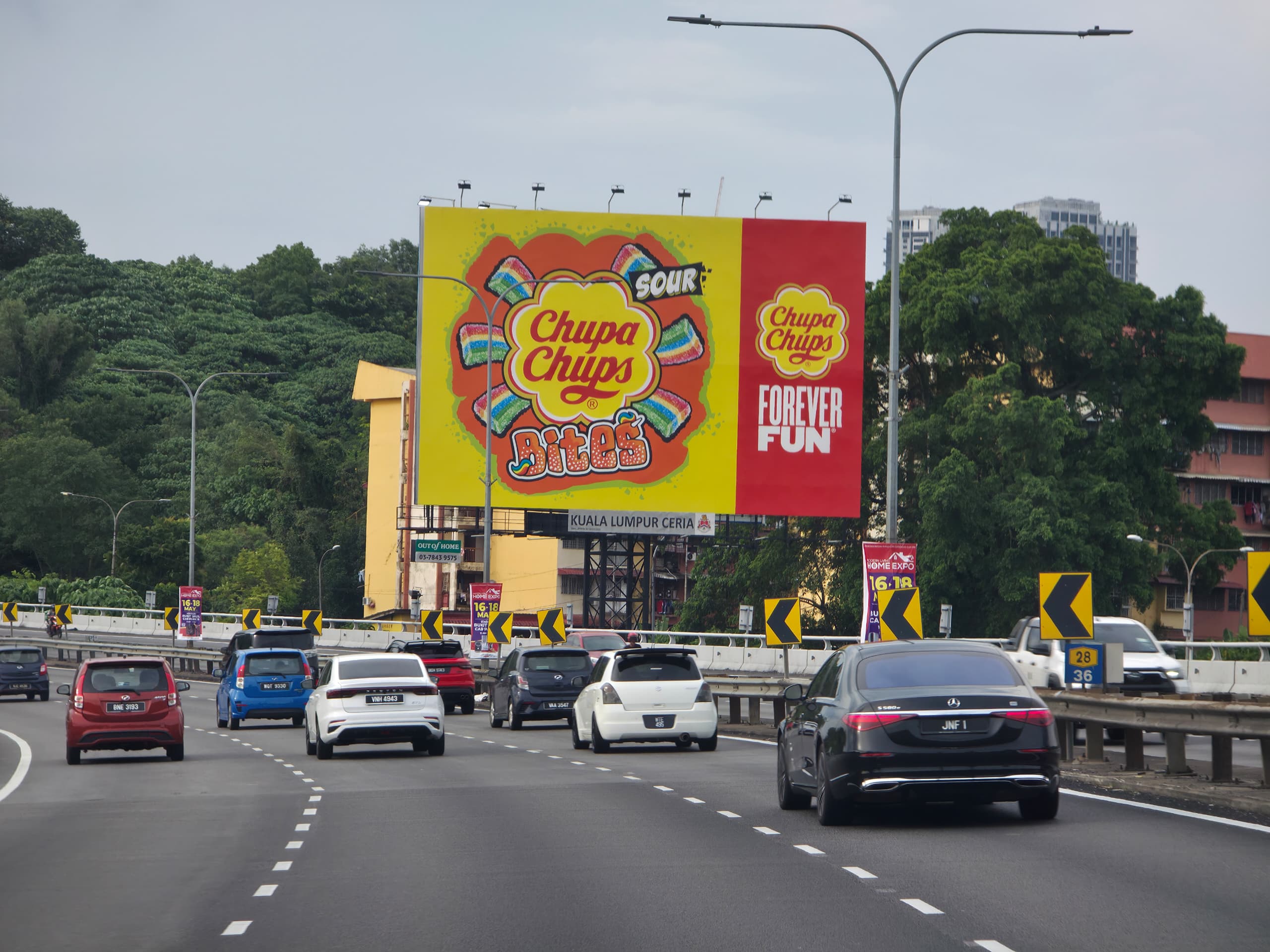 Unipole and gantry billboards in Malaysia highlighting billboard advertising cost and structure-specific pricing.
